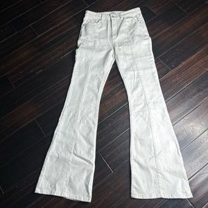 Flare bottom white jeans hippie indie casual festival coastal beach vibes